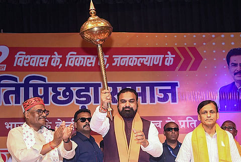 Bihar Chief Minister Samrat Choudhary holds a mace during an event organized by BJP Ati Pichhda Prakoshth (Extremely Backward Class Cell), in Patna.
