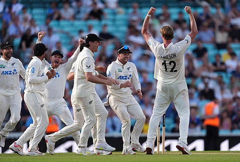 New Zealand's Kyle Jamieson celebrates after England's James Rew is caught on day four of the Second Rothesay Test cricket match between England and New Zealand in London, England.