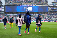 AP/Matt Slocum : France's N'Golo Kante, left, Jean-Philippe Mateta, center, and Warren Zaire-Emery leave the pitch at the end of the first time