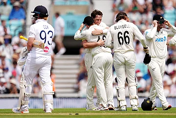| Photo: Ben Whitley/PA via AP : New Zealand's Matt Henry celebrates taking the wicket of England's Jordan Cox on day five of the Second Rothesay Test cricket match between England and New Zealand in London, England.