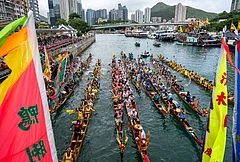 Competitors take part in the Aberdeen Dragon Boat Race to celebrate the Dragon Boat Festival in Hong Kong. - | Photo: AP/Chan Long Hei