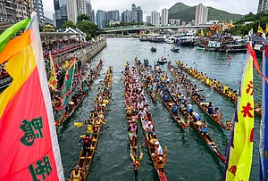 | Photo: AP/Chan Long Hei : Competitors take part in the Aberdeen Dragon Boat Race to celebrate the Dragon Boat Festival in Hong Kong.