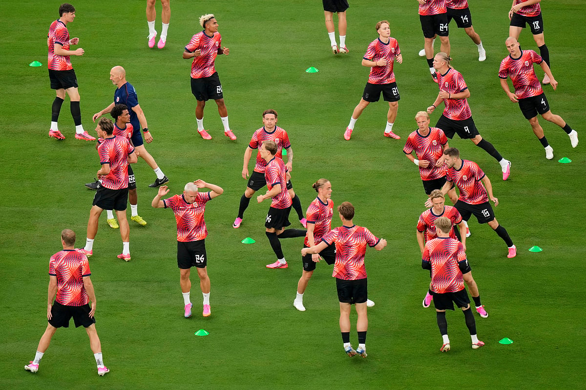 Norway players warm up ahead of the World Cup Group I soccer match between Norway and Senegal in East Rutherford, N.J - AP/Seth Wenig