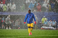 France Vs Iraq, FIFA World Cup 2026: See Best Photos From Group I Clash In Philadelphia AP/Derik Hamilton : France goalkeeper Mike Maignan (16) warms up as rain falls following a weather delay in the World Cup Group I soccer match between France and Iraq in Philadelphia