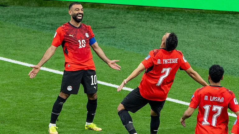 Egypt’s Trezeguet (7) celebrates his goal against New Zealand with teammate Mohamed Salah (10) during the World Cup Group G soccer match between New Zealand and Egypt in Vancouver, British Columbia, Sunday, June 21, 2026 - (Timothy Matwey/The Canadian Press via AP