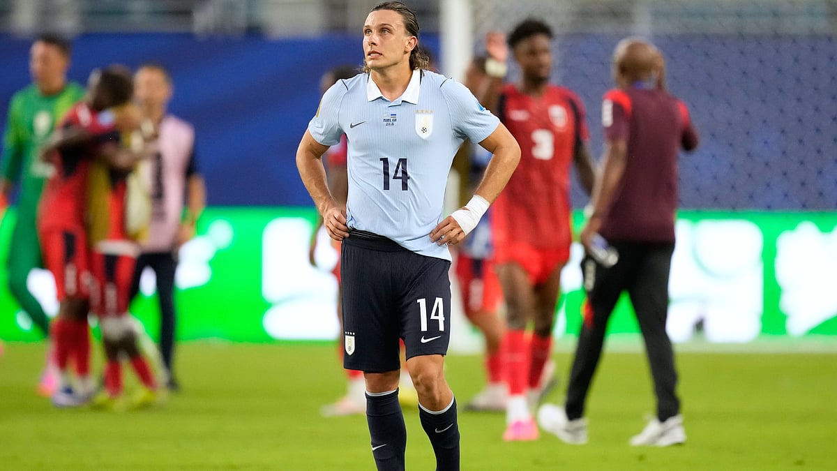 Uruguay's Agustin Canobbio (14) reacts following the World Cup Group H soccer match between Uruguay and Cape Verde in Miami Gardens, Fla., Sunday, June 21, 2026 - (AP Photo/Rebecca Blackwell)