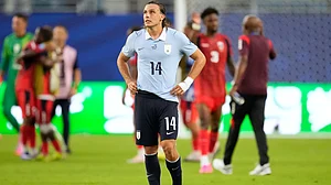 (AP Photo/Rebecca Blackwell) : Uruguay's Agustin Canobbio (14) reacts following the World Cup Group H soccer match between Uruguay and Cape Verde in Miami Gardens, Fla., Sunday, June 21, 2026