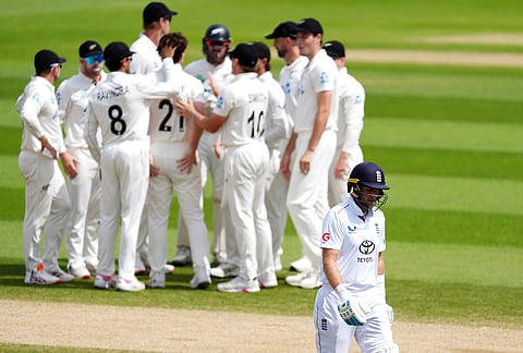 England's Joe Root reacts after being bowled out by New Zealand's Matt Henry on day five  of the Second Rothesay Test cricket match between England and New Zealand in London, England.