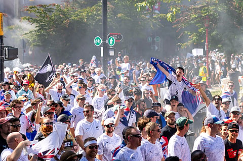 New Zealand fans march to BC Place prior to a World Cup Group G soccer match against Egypt in Vancouver, British Columbia, Sunday, June 21, 2026