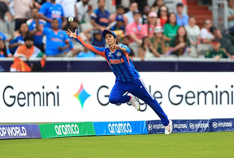 India's Jemimah Rodrigues attempts to catch the ball from South Africa's Marizanne Kapp during the ICC Women's T20 World Cup match between India and South Africa, at Emirates Old Trafford, Manchester, England.