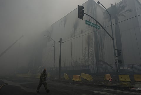 Smoke from a warehouse fire fills the air in the Boyle Heights neighborhood of Los Angeles.