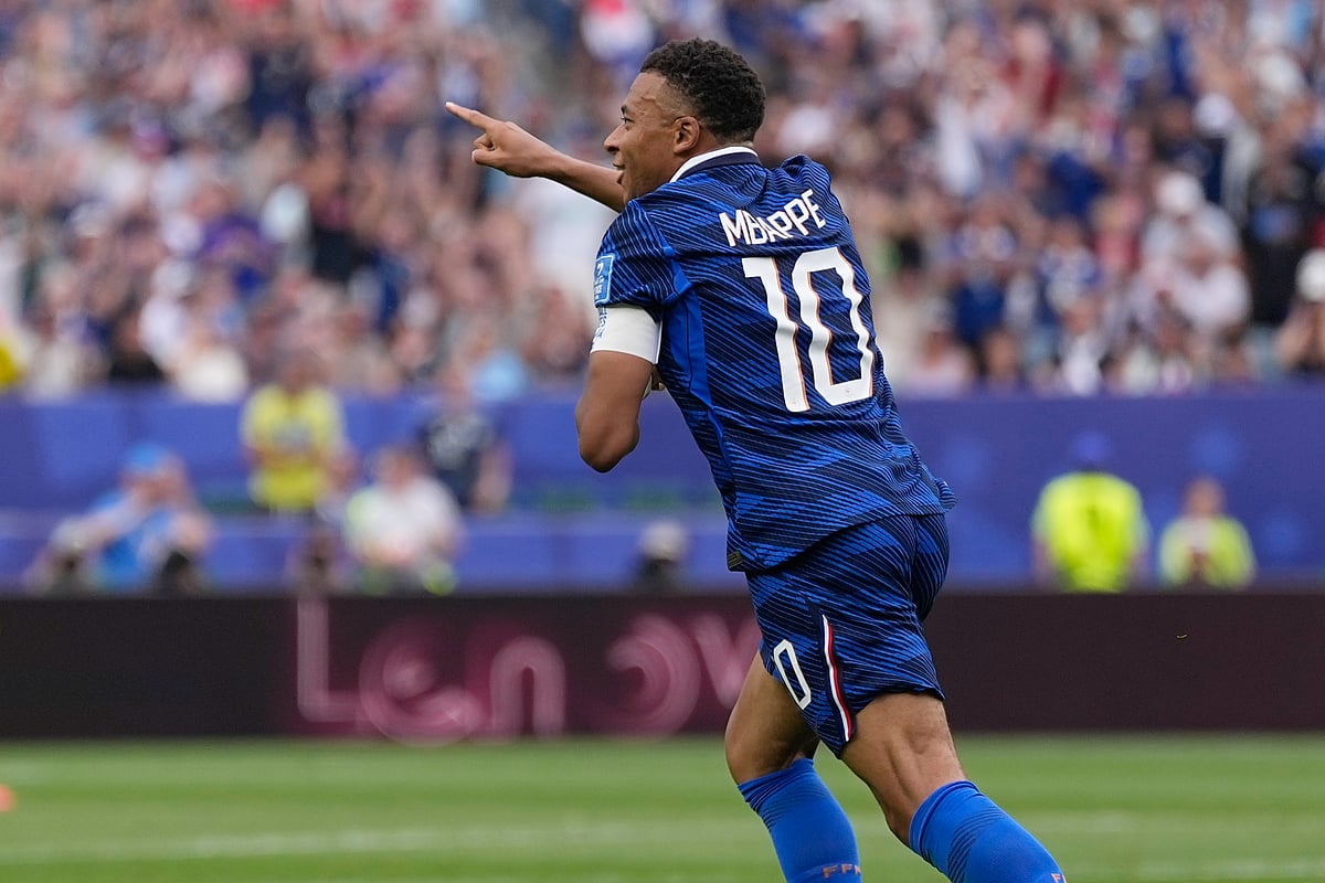 France's Kylian Mbappe celebrates scoring his side's opening goal during the World Cup Group I soccer match - AP/Matt Slocum