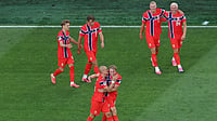 AP Photo/Mark Stockwell : Norway's Leo Oestigard (4) celebrates with teammate Norway's Kristian Thorstvedt (18) after scoring his side's third goal during the World Cup Group I soccer match between Iraq and Norway in Foxborough, Mass., near Boston, Tuesday, June 16, 2026.