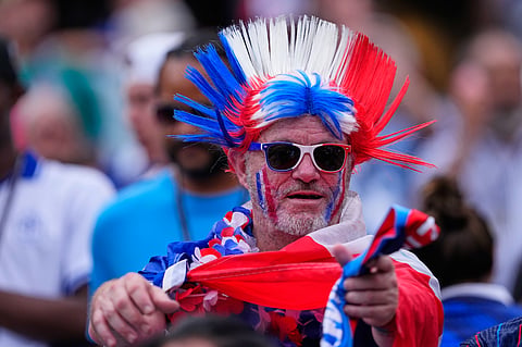 Supporters react ahead of the World Cup Group I soccer match between France and Iraq in Philadelphia
