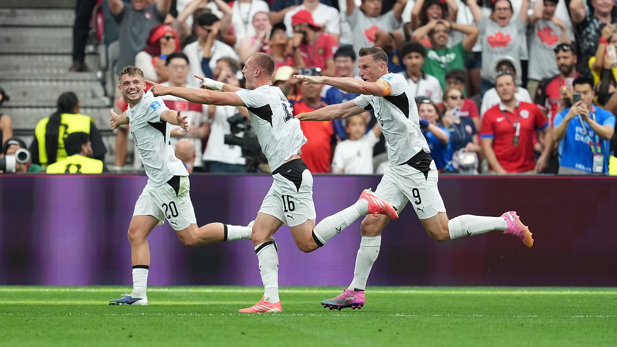 New Zealand's Finn Surman (16) celebrates his goal with New Zealand's Callum McCowatt (20) and New Zealand's Chris Wood (9) against Egypt during the first half of the World Cup Group G soccer match in Vancouver, British Columbia, Sunday, June 21, 2026 - (Ethan Cairns/The Canadian Press via AP)