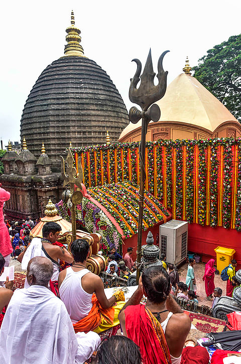 Seers offer prayers at the 'Kamakhya Temple' during the 'Ambubachi Mela', in Guwahati, Assam.