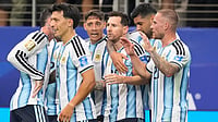 AP/Tony Gutierrez : Argentina's Lionel Messi (10) celebrates scoring his side's first goal against Austria with teammates becoming FIFA World Cup's highest ever goalscorer