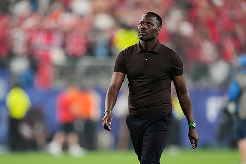 Senegal head coach Pape Thiaw walks off the pitch after the World Cup Group I soccer match between Norway and Senegal in East Rutherford, N.J., near New York, Monday, June 22, 2026