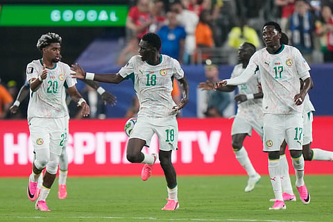 Senegal's Ismaila Sarr (18) celebrates with teammates after scoring their third goal during the World Cup Group I soccer match between Norway and Senegal in East Rutherford, N.J., near New York, Monday, June 22, 2026