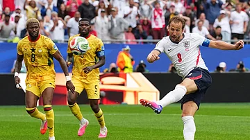 Martin Meissner/AP Photo : England's Harry Kane (9) tries a shot during the World Cup Group L soccer match between England and Ghana in Foxborough.