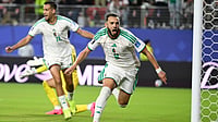 (AP Photo/Eakin Howard) : Algeria's Amine Gouiri, front, celebrates after scoring his side's second goal against Jordan during the World Cup Group J soccer match in Santa Clara, Calif., near San Francisco, Monday, June 22, 2026
