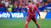 Ashley Landis/AP Photo : Portugal's Cristiano Ronaldo celebrates after scoring the opening goal during the World Cup Group K soccer match between Portugal and Uzbekistan in Houston.