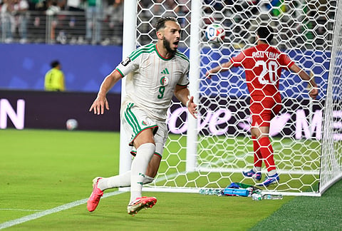Algeria's Amine Gouiri celebrates after scoring his side's second goal against Jordan during the World Cup Group J soccer match in Santa Clara, Calif., near San Francisco.