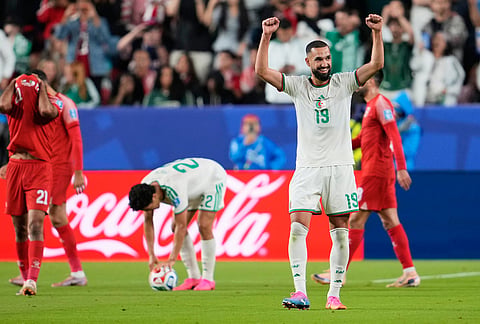 Algeria's Nabil Bentaleb (19) celebrates after their win in the World Cup Group J soccer match between Jordan and Algeria in Santa Clara, Calif., near San Francisco.