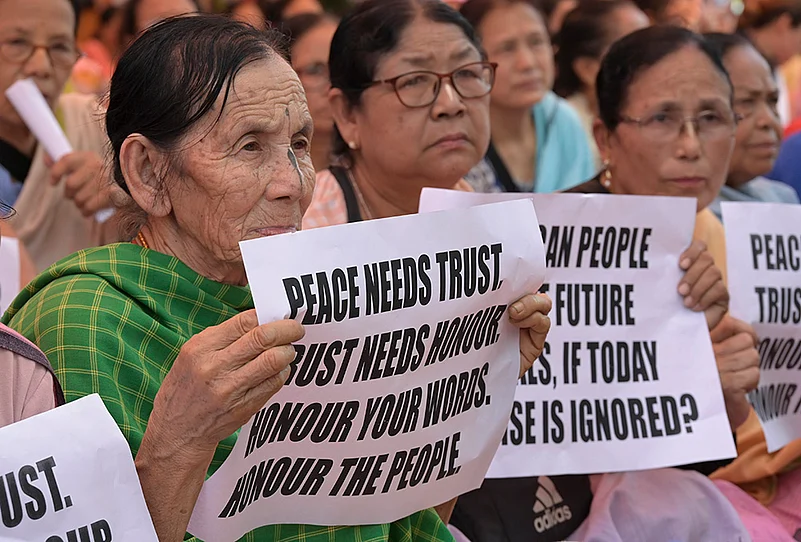 Women vendors protest alleged arrest of Meitei volunteers in Imphal