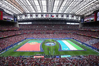 AP/Karen Warren : Flags for Portugal and Uzbekistan are displayed ahead of the World Cup Group K soccer match between Portugal and Uzbekistan.