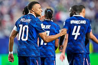 France Shrugs Off Weather Chaos As Mbappe Downs Iraq (AP Photo/Petr David Josek) : France's Kylian Mbappe (10) reacts after scoring his team's second goal during the World Cup Group I soccer match between France and Iraq in Philadelphia, Monday, June 22, 2026