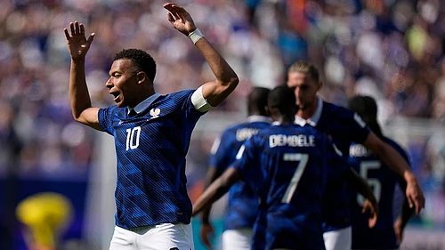 AP Photo/Frank Franklin II : Frances Kylian Mbappe celebrates after scoring the opening goal of his team during the World Cup Group I soccer match between France and Senegal in East Rutherford, N.J., near New York, Tuesday, June 16, 2026.