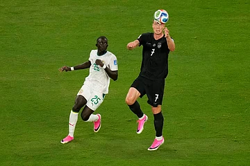 AP/Seth Wenig : Senegal's El Hadji Malick Diouf (25), left, vies for the ball with Norway's Alexander Soerloth (7) during the World Cup Group I soccer match.