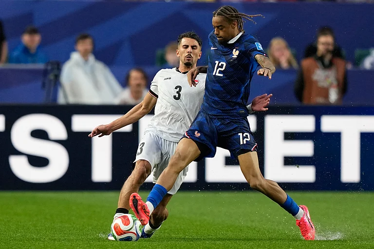 France vs Iraq FIFA World Cup 2026 Live Score: Iraq's Hussein Ali, left, and France's Bradley Barcola compete for the ball - Matt Slocum/AP