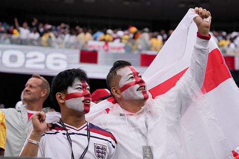 English fans cheer during the World Cup Group L soccer match between England and Ghana in Foxborough, Mass