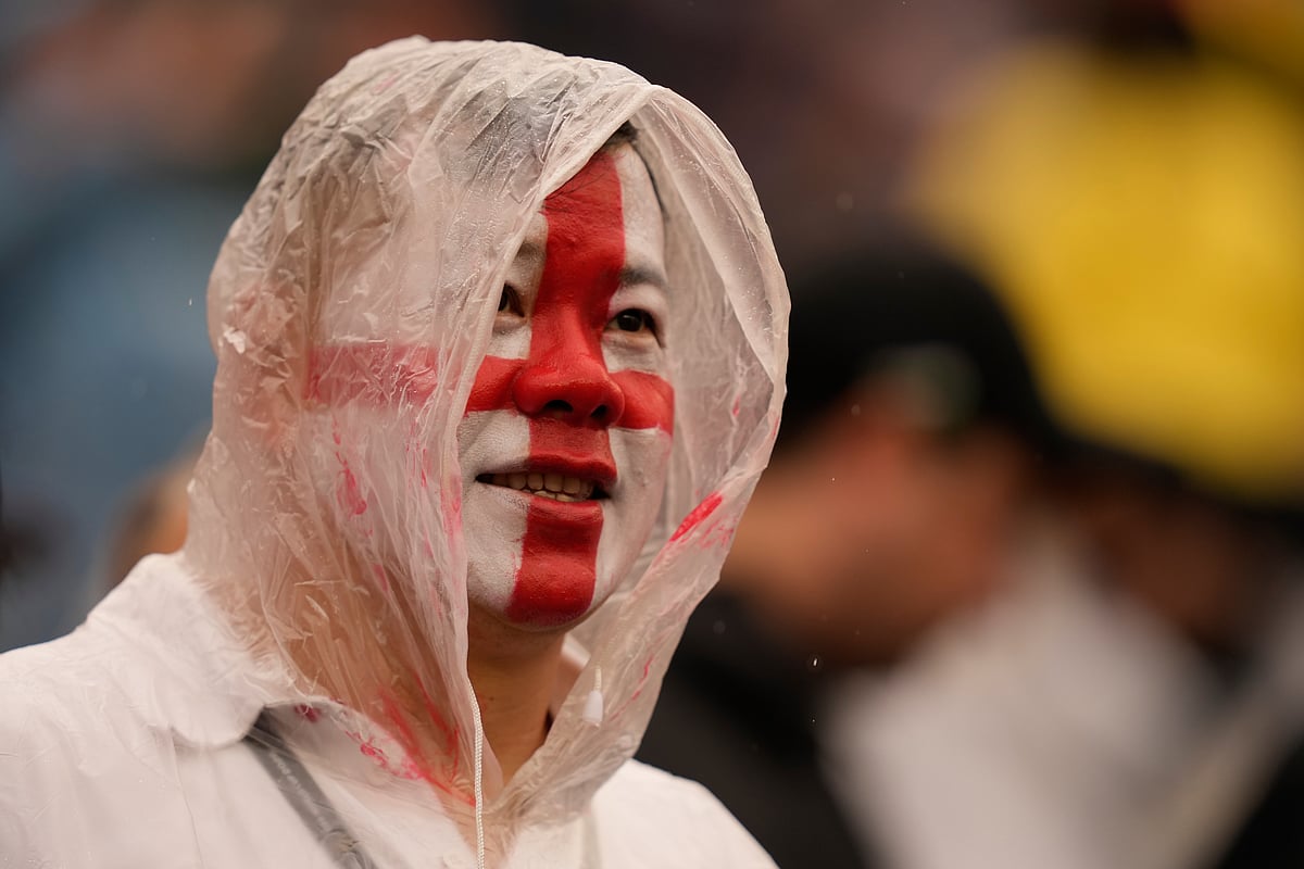 England fan waits for the World Cup Group L soccer match between England and Ghana in Foxborough, Mass., near Boston, - AP/Charlie Krupa
