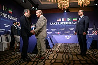 (Fabrice Coffrini/Keystone via AP) : Iran's Foreign Minister Abbas Araghchi, left, shakes hands with Pakistan's Prime Minister Muhammad Shehbaz Sharif next to Pakistan's Chief of Army Staff Field Marshal Asim Munir, right, prior to a quadrilateral meeting between the United States, Iran, Pakistan and Qatar at the Burgenstock luxury hotel complex overlooking Lake Lucerne, Switzerland, Sunday June 21, 2026. 