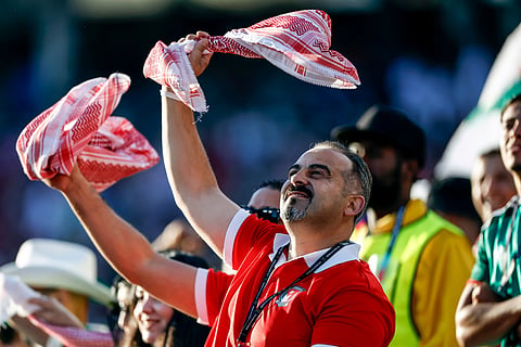Jordanian fans get ready for action before the World Cup Group J soccer match between Jordan and Algeria in Santa Clara, Calif., near San Francisco.