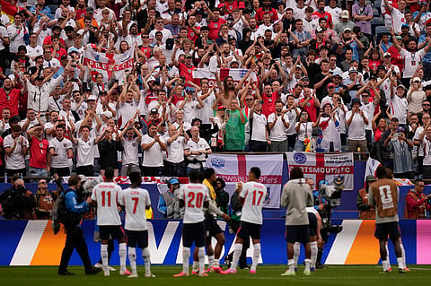 English players applaud to their fans during the World Cup Group L soccer match between England and Ghana in Foxborough.