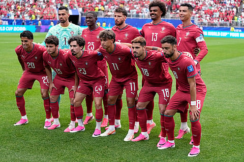 Portugal players pose before the World Cup Group K soccer match between Portugal and Uzbekistan in Houston,