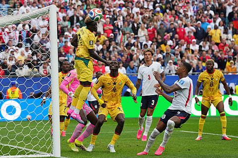 Ghana's Kojo Peprah Oppong (21), left, heads for the ball during the World Cup Group L soccer match between England and Ghana in Foxborough.