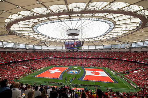 National flags are displayed before the World Cup Group B soccer match between Switzerland and Canada in Vancouver, British Columbia, Wednesday, June 24, 2026.