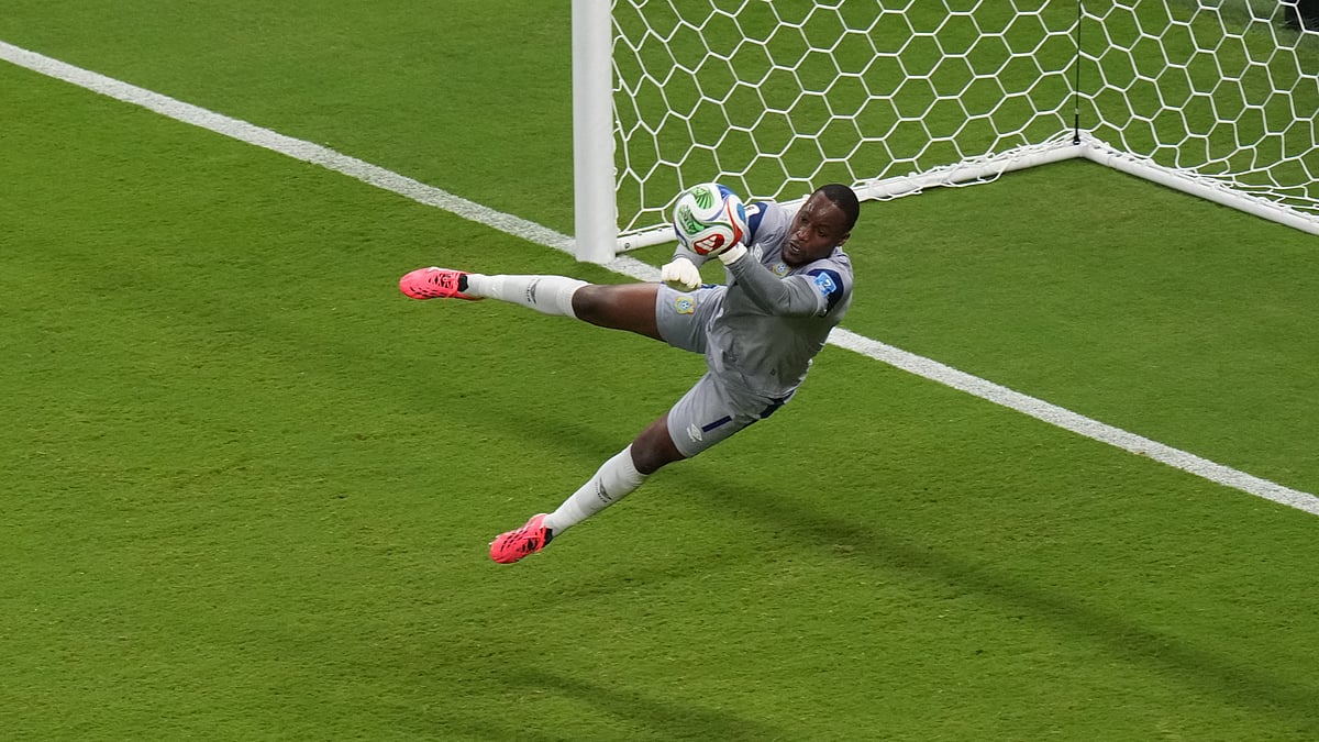 Congo goalkeeper Lionel Mpasi (1) makes a save during the World Cup Group K soccer match between Colombia and Congo in Zapopan, near Guadalajara, Mexico, Tuesday, June 23, 2026. - (AP Photo/Silvia Izquierdo)