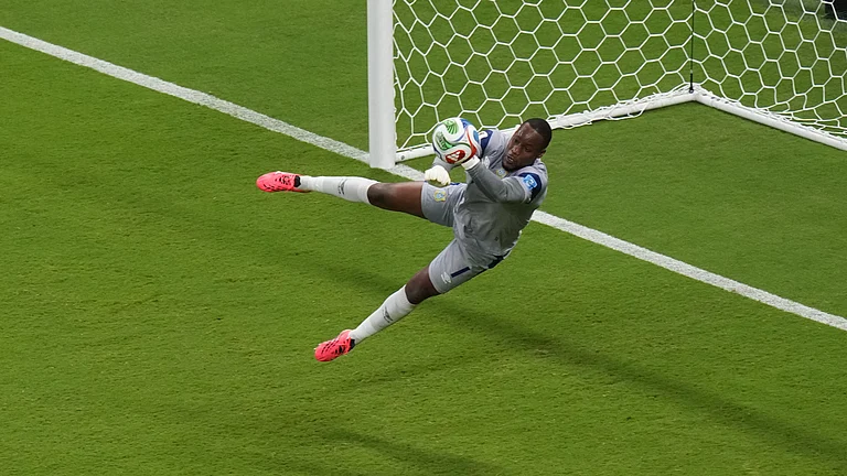 Congo goalkeeper Lionel Mpasi (1) makes a save during the World Cup Group K soccer match between Colombia and Congo in Zapopan, near Guadalajara, Mexico, Tuesday, June 23, 2026. - (AP Photo/Silvia Izquierdo)
