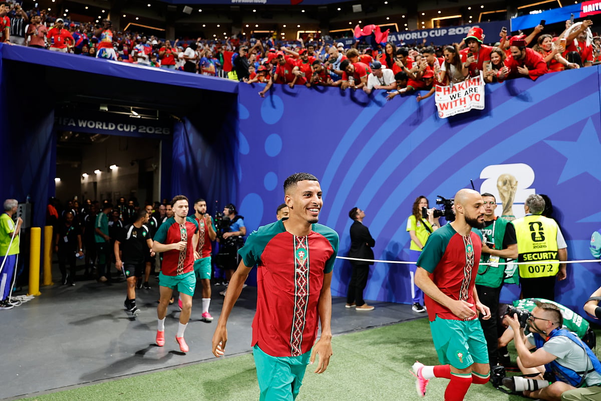 Morocco players jog onto the pitch for warmups before the World Cup Group C soccer match between Morocco and Haiti in Atlanta, Wednesday, June 24, 2026. - (AP Photo/Erik S. Lesser)