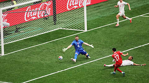 Switzerland's Ruben Vargas (17) scores a goal past Canada goalkeeper Maxime Crepeau (16) during the World Cup Group B soccer match between Switzerland and Canada in Vancouver, British Columbia, Wednesday, June 24, 2026.