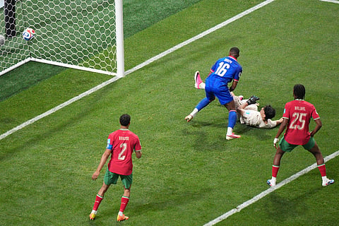 Haiti score a goal past Morocco goalkeeper Yassine Bounou, second from right, during the World Cup Group C soccer match between Morocco and Haiti in Atlanta, Wednesday, June 24, 2026.