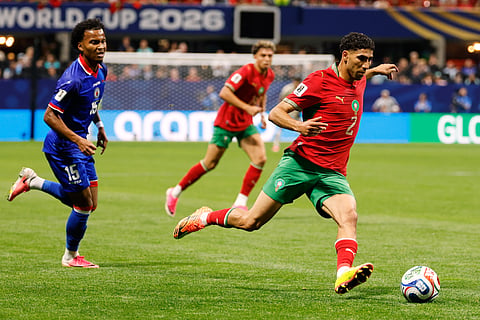 Morocco's Achraf Hakimi (2) controls the ball in front of Haiti's Ruben Providence (15) during the World Cup Group C soccer match between Morocco and Haiti in Atlanta, Wednesday, June 24, 2026.