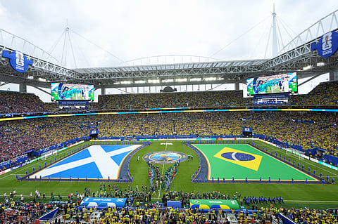 The flags of Scotland and Brazil are displayed during pre-game ceremonies before their World Cup Group C soccer match in Miami Gardens, Fla., Wednesday, June 24, 2026.