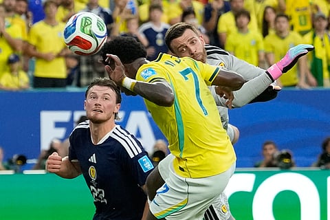 Brazil's Vinicius Junior (7) scores his team's second goal during the World Cup Group C soccer match between Scotland and Brazil in Miami Gardens, Fla., Wednesday, June 24, 2026.